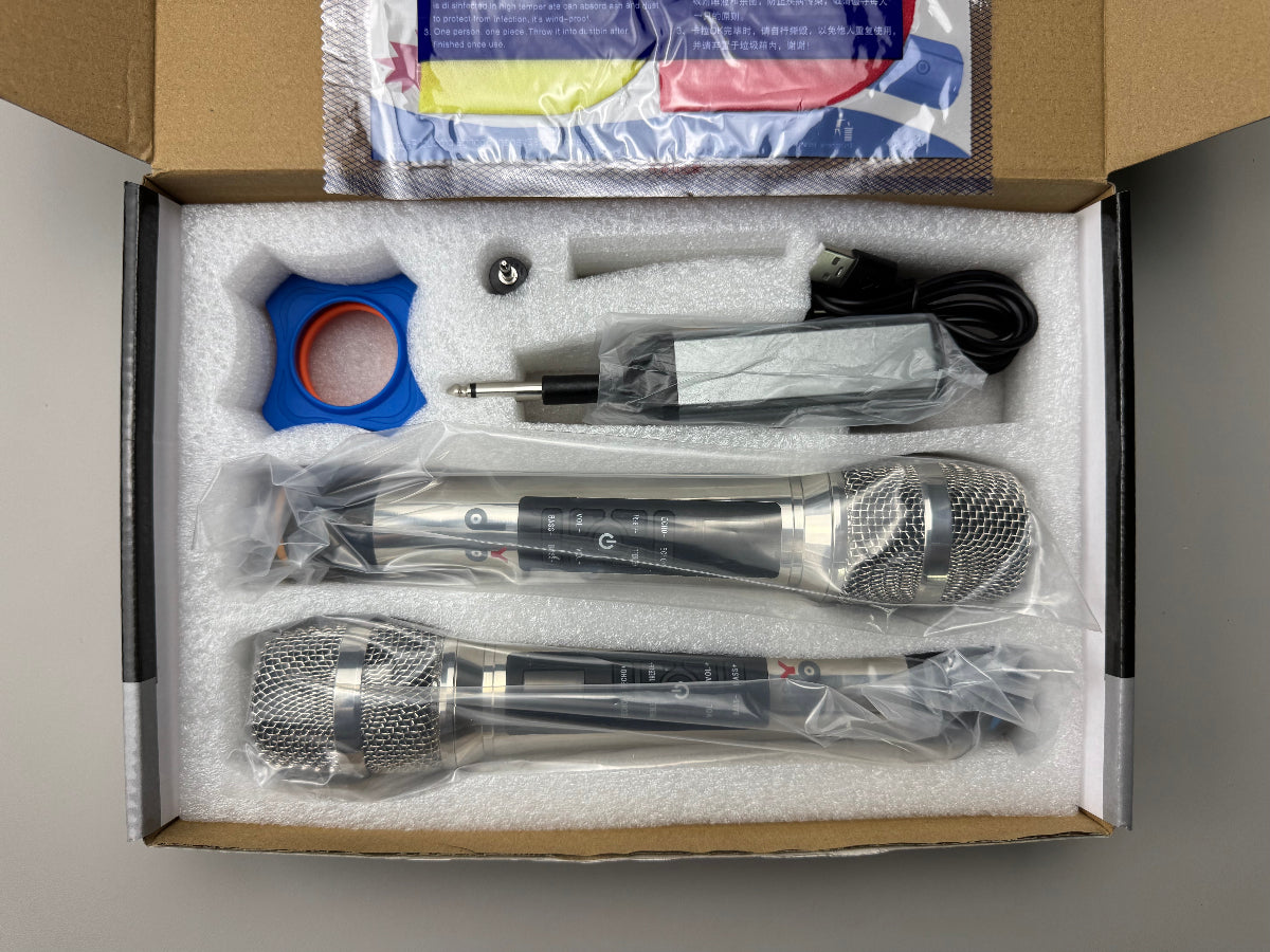 Two diodiy's wireless microphones sliver signal receiver and multiple accessories for free adjustable for treble bass volume and echo perfect for karaoke events parties stage going live UHF transmission technique